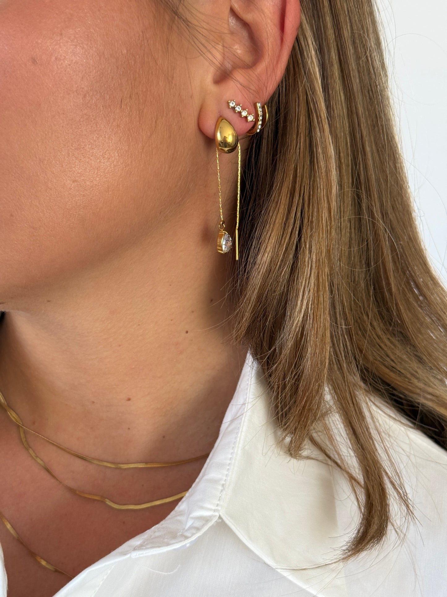 Oorbel met hangend strass steen - Goud